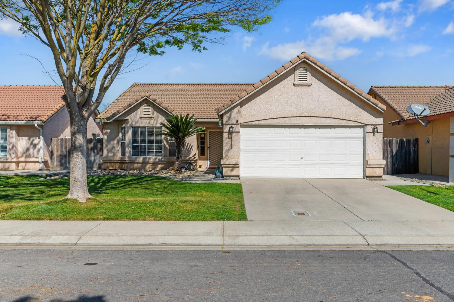 2713 Amadeus Drive Modesto, CA 95358 - Photo 1 of 1 front view of house with a yard
