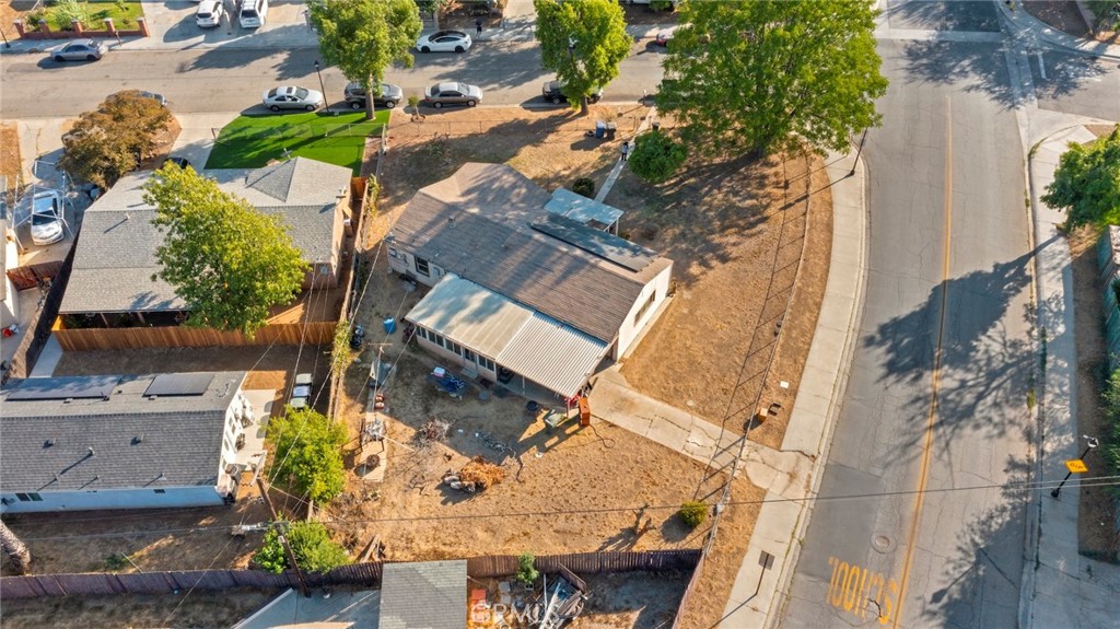 8925 Penny Drive Riverside, CA 92503 - Photo 13 of 48 an aerial view of multiple houses with yard