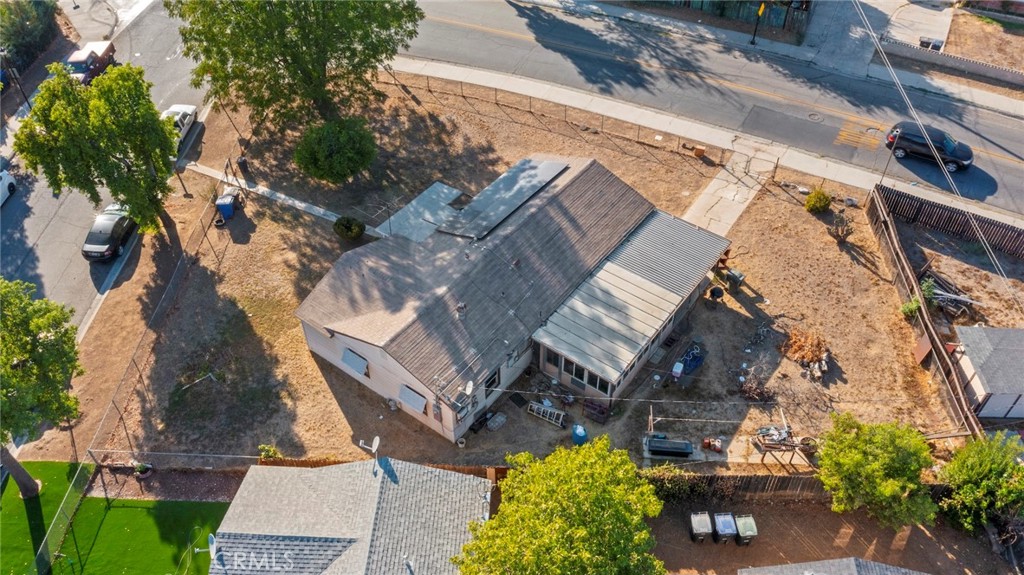 8925 Penny Drive Riverside, CA 92503 - Photo 15 of 48 an aerial view of a house with a yard wooden table and chairs