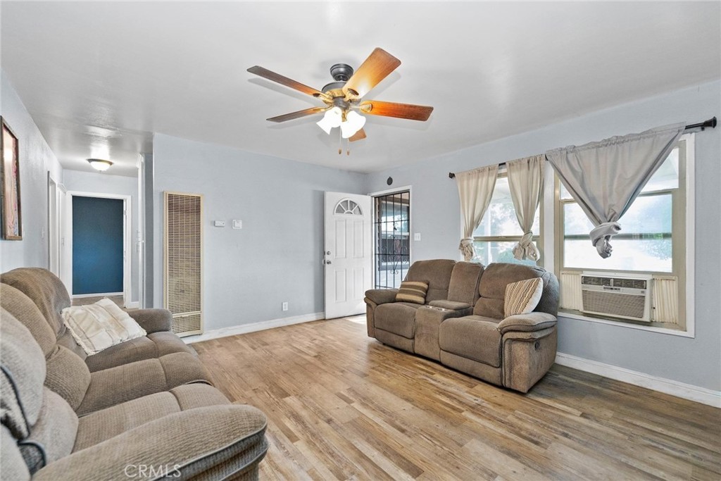 8925 Penny Drive Riverside, CA 92503 - Photo 17 of 48 a living room with furniture and a window