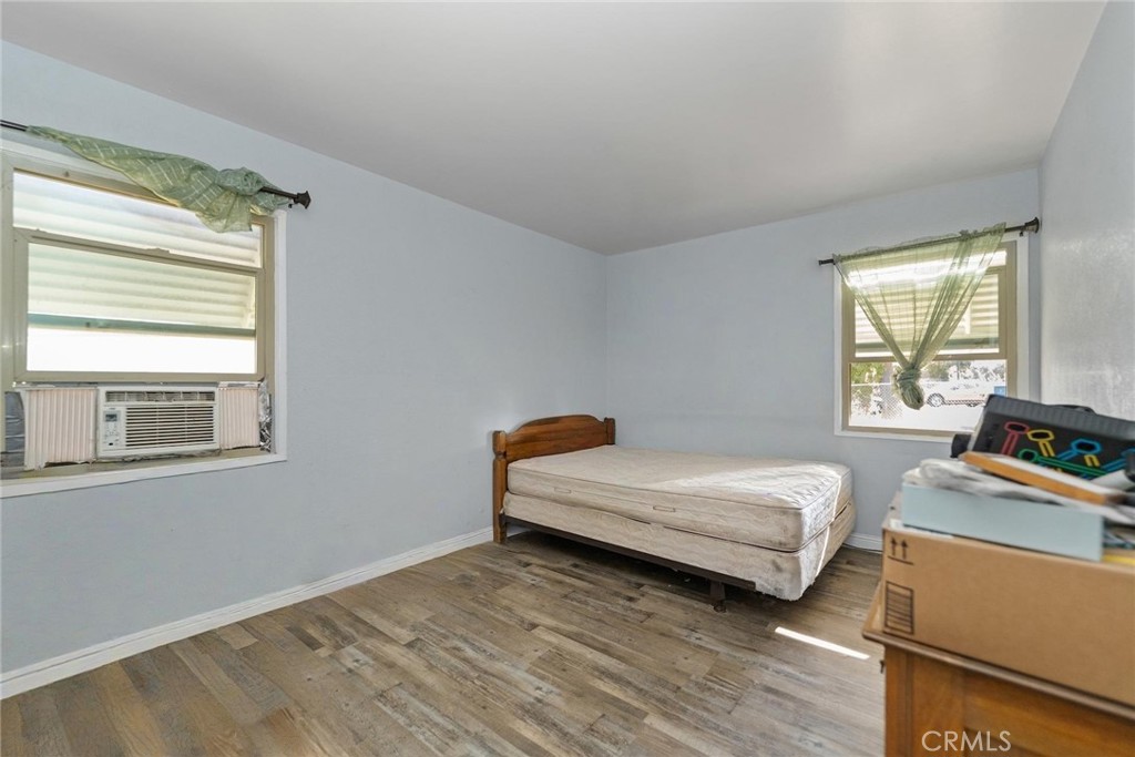 8925 Penny Drive Riverside, CA 92503 - Photo 20 of 48 a bedroom with a bed and a window