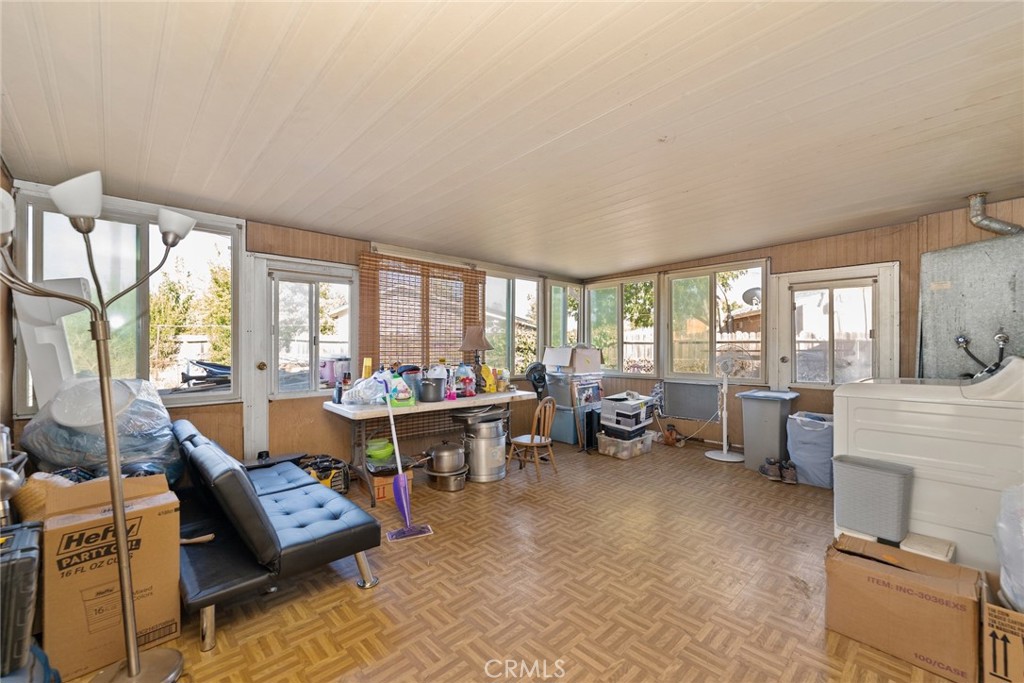 8925 Penny Drive Riverside, CA 92503 - Photo 30 of 48 a living room with furniture and a fireplace