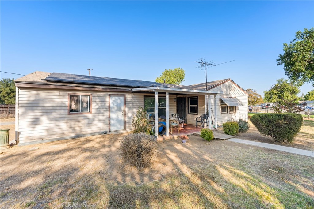 8925 Penny Drive Riverside, CA 92503 - Photo 34 of 48 a front view of a house with a yard outdoor seating and barbeque oven