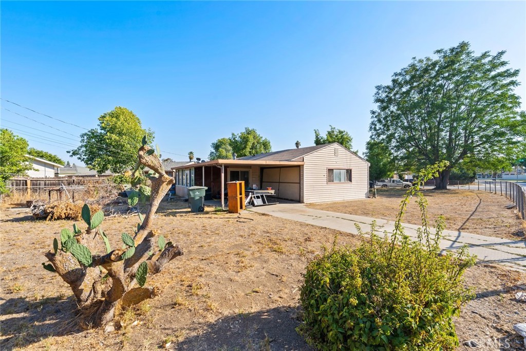 8925 Penny Drive Riverside, CA 92503 - Photo 39 of 48 a house with trees in the background