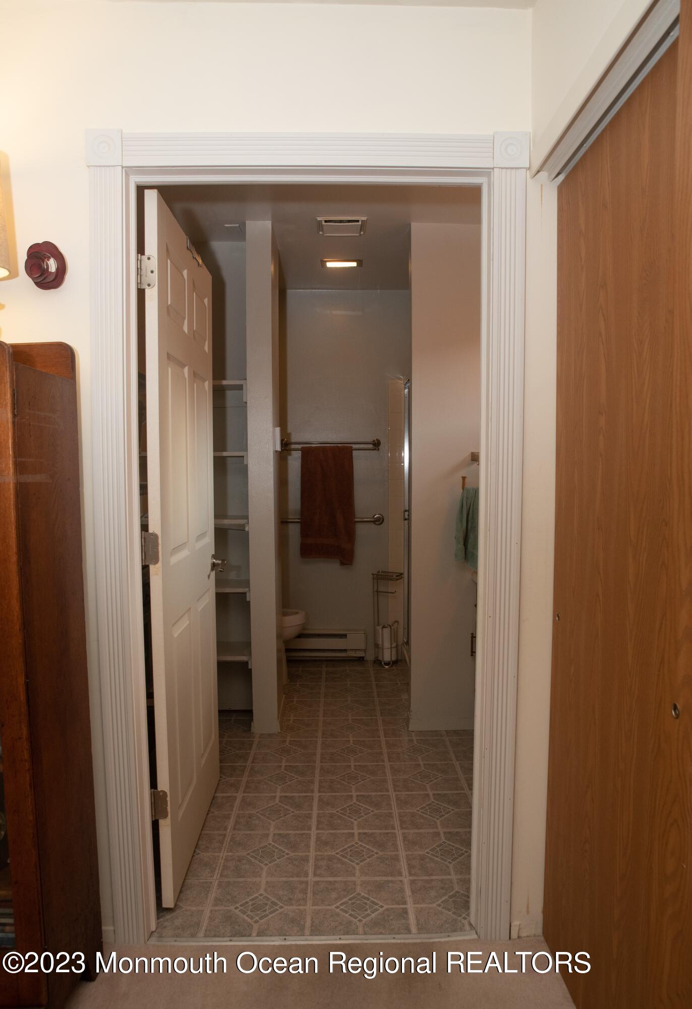 32 Ashley Road Whiting, NJ 08759 - Photo 15 of 23 a bathroom with a glass door shower and a sink