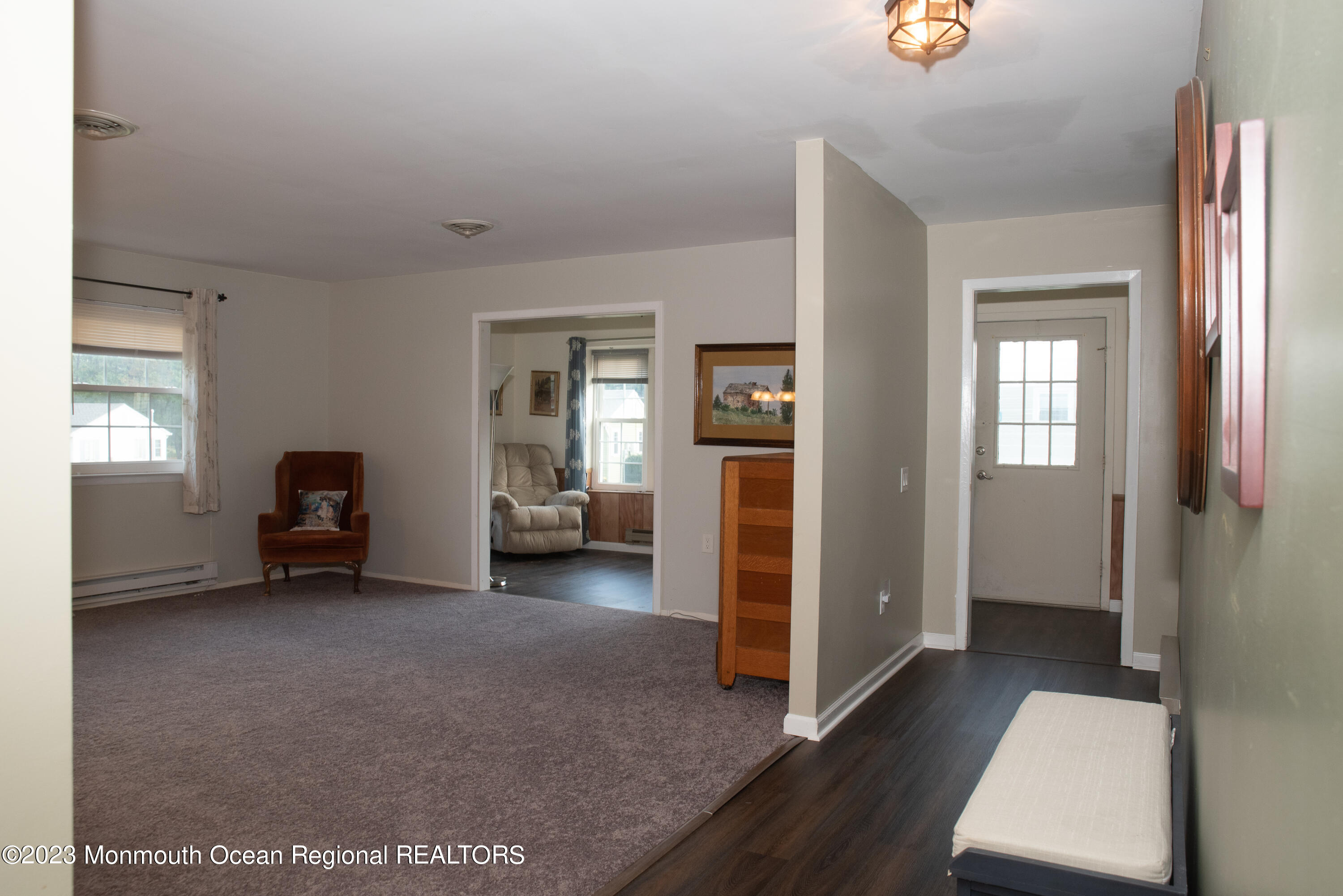 32 Ashley Road Whiting, NJ 08759 - Photo 5 of 23 a view of a livingroom with wooden floor and windows