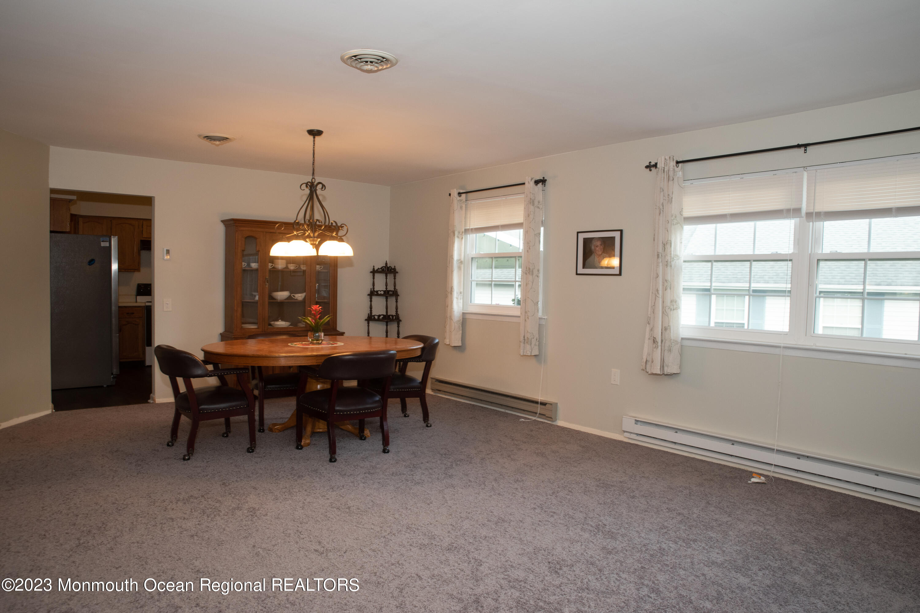 32 Ashley Road Whiting, NJ 08759 - Photo 9 of 23 a view of a dining room with furniture and chandelier