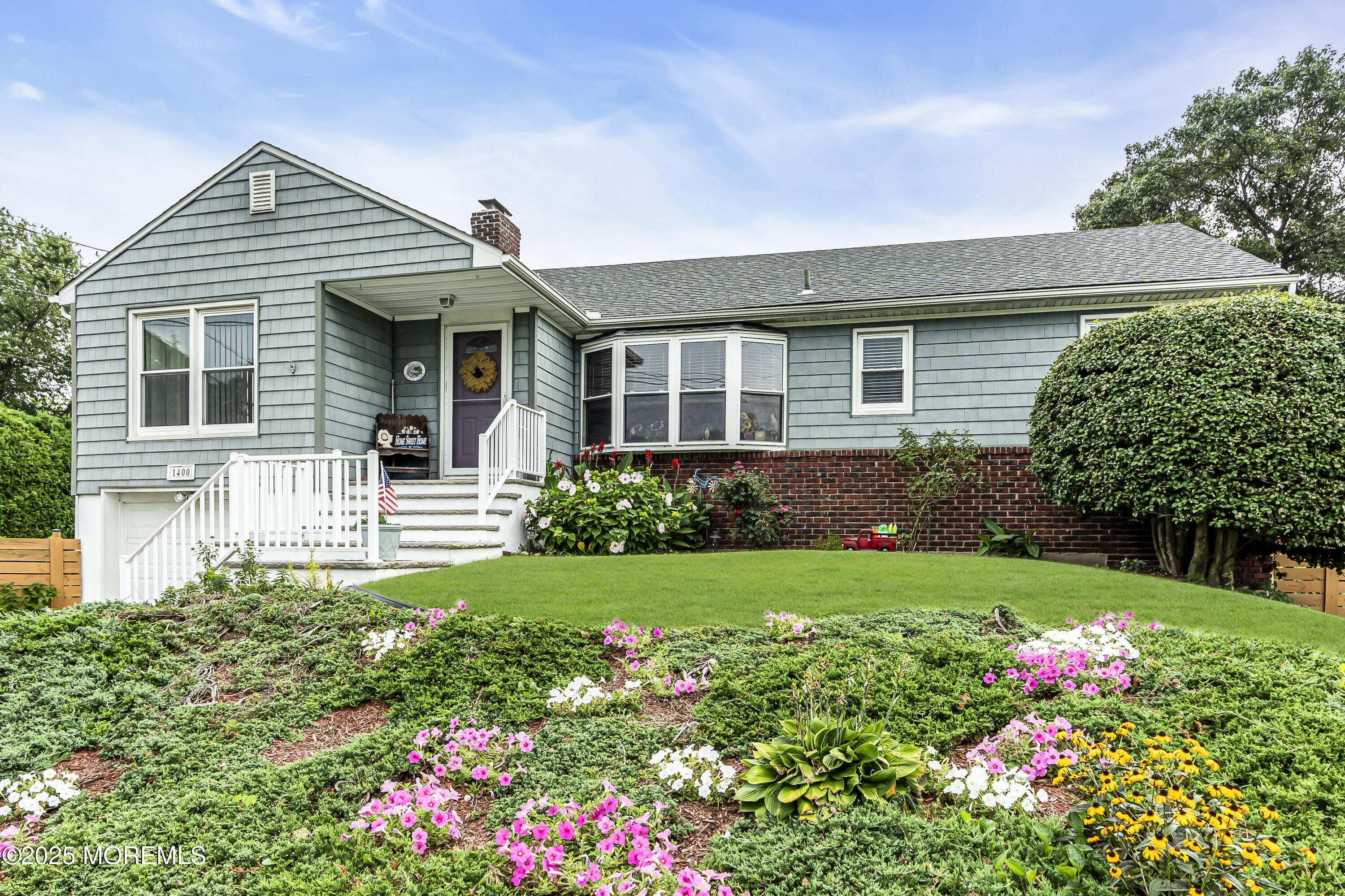 1400 Treeneedle Road Point Pleasant, NJ 08742 - Photo 1 of 45 a front view of a house with a yard