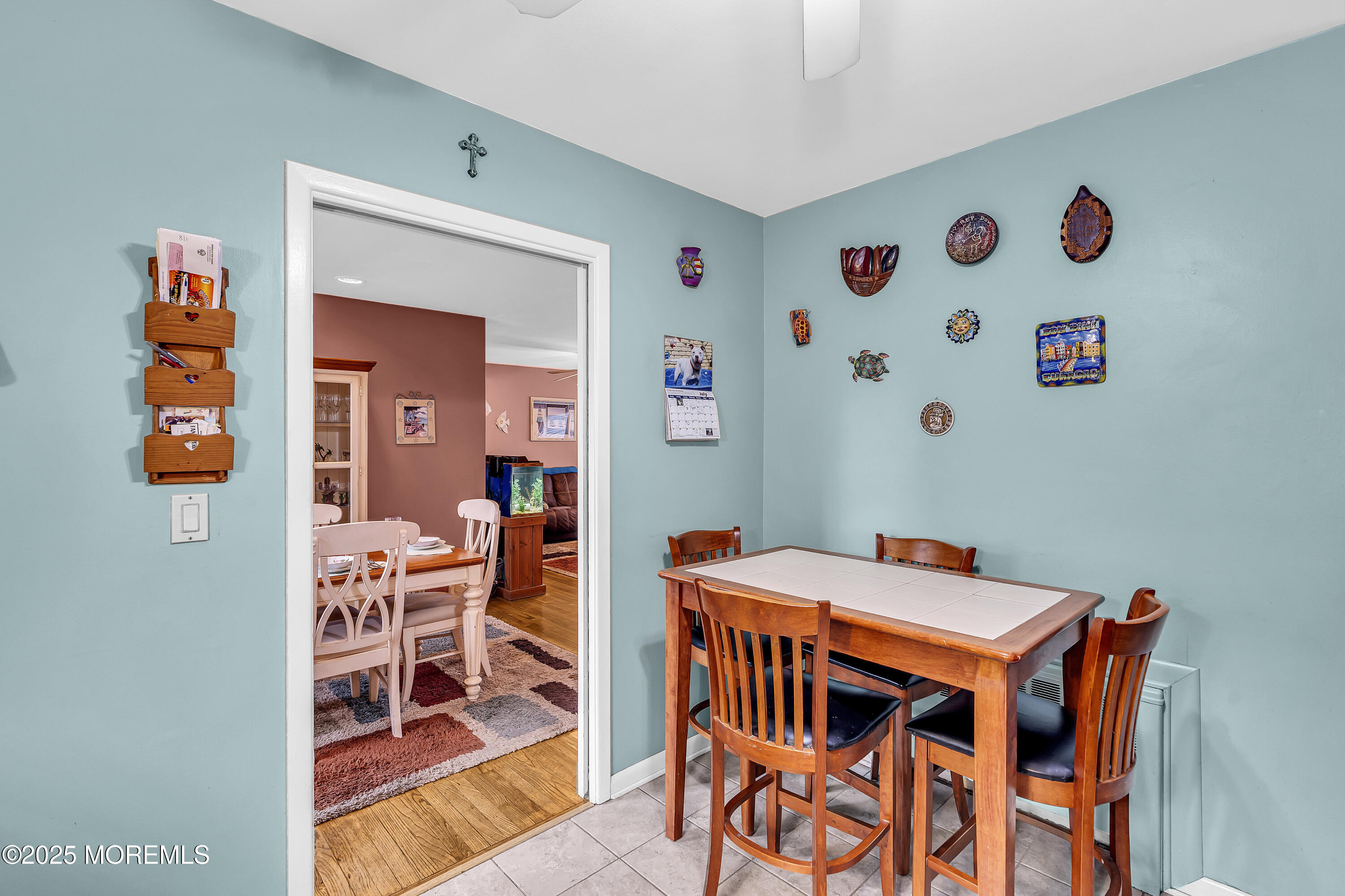 1400 Treeneedle Road Point Pleasant, NJ 08742 - Photo 20 of 45 a view of a dining room with furniture and wooden floor