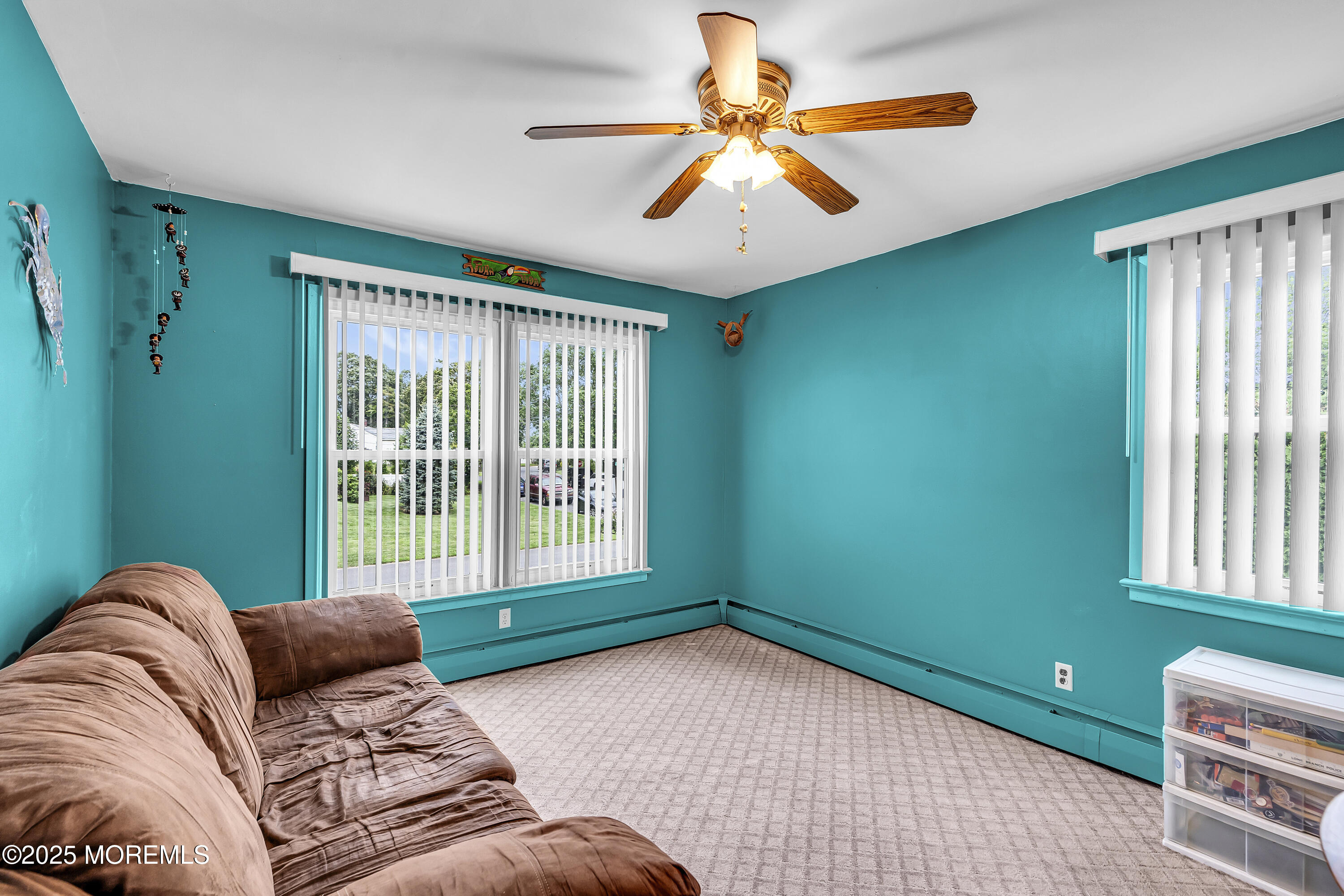 1400 Treeneedle Road Point Pleasant, NJ 08742 - Photo 21 of 45 a bedroom with a bed and a window