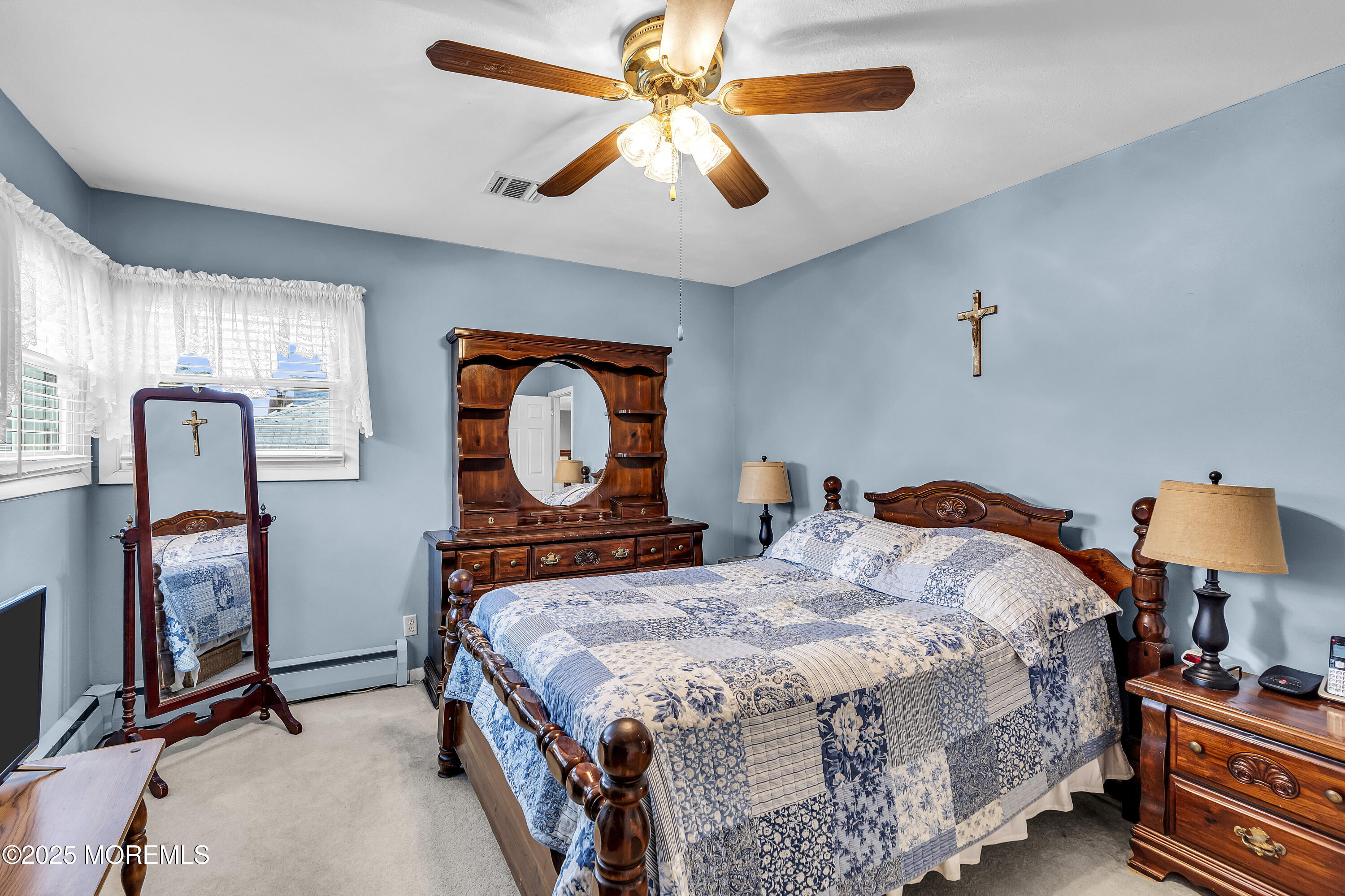 1400 Treeneedle Road Point Pleasant, NJ 08742 - Photo 26 of 45 a bedroom with bed and window