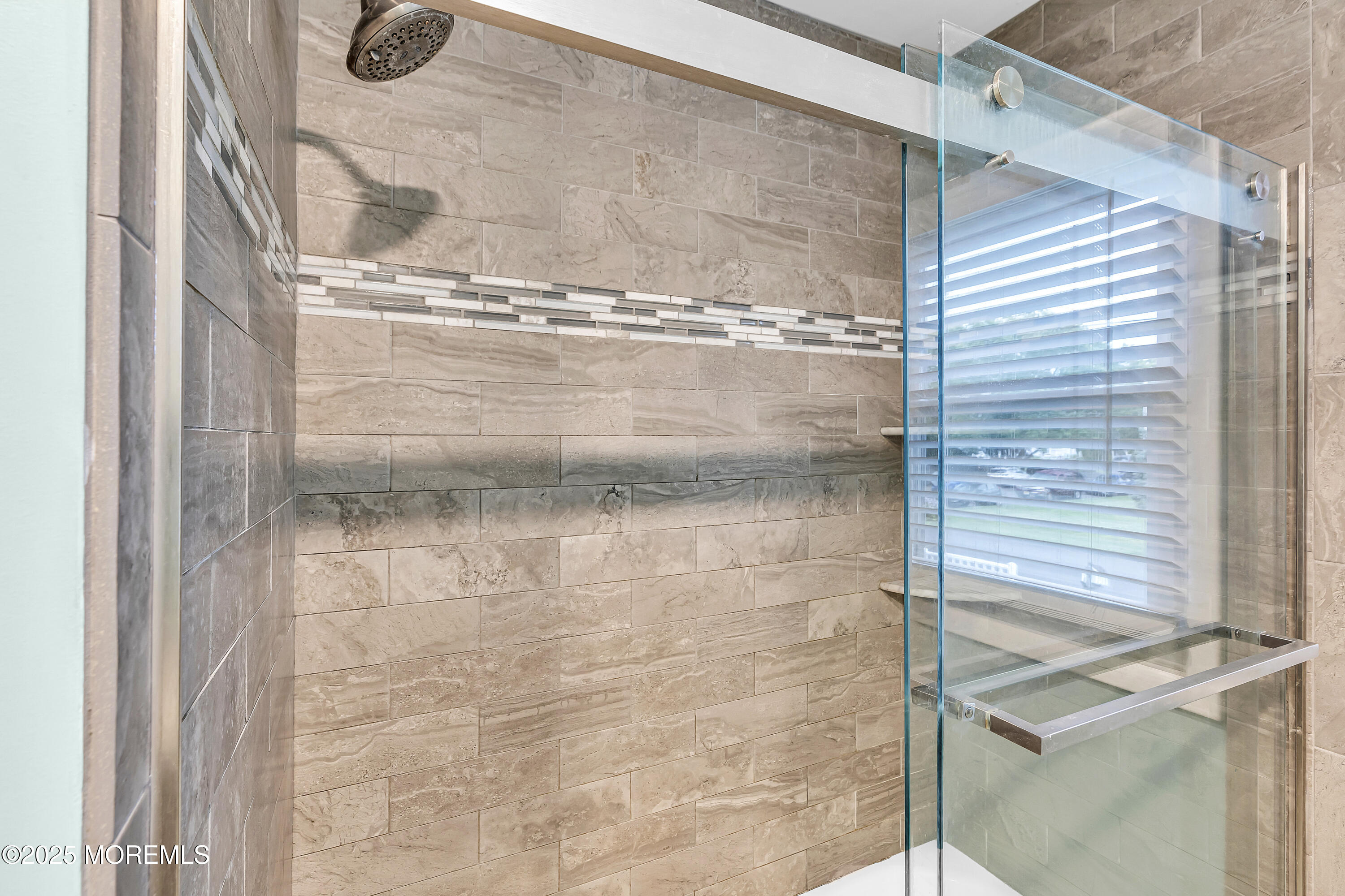 1400 Treeneedle Road Point Pleasant, NJ 08742 - Photo 39 of 45 a bathroom with a glass shower door