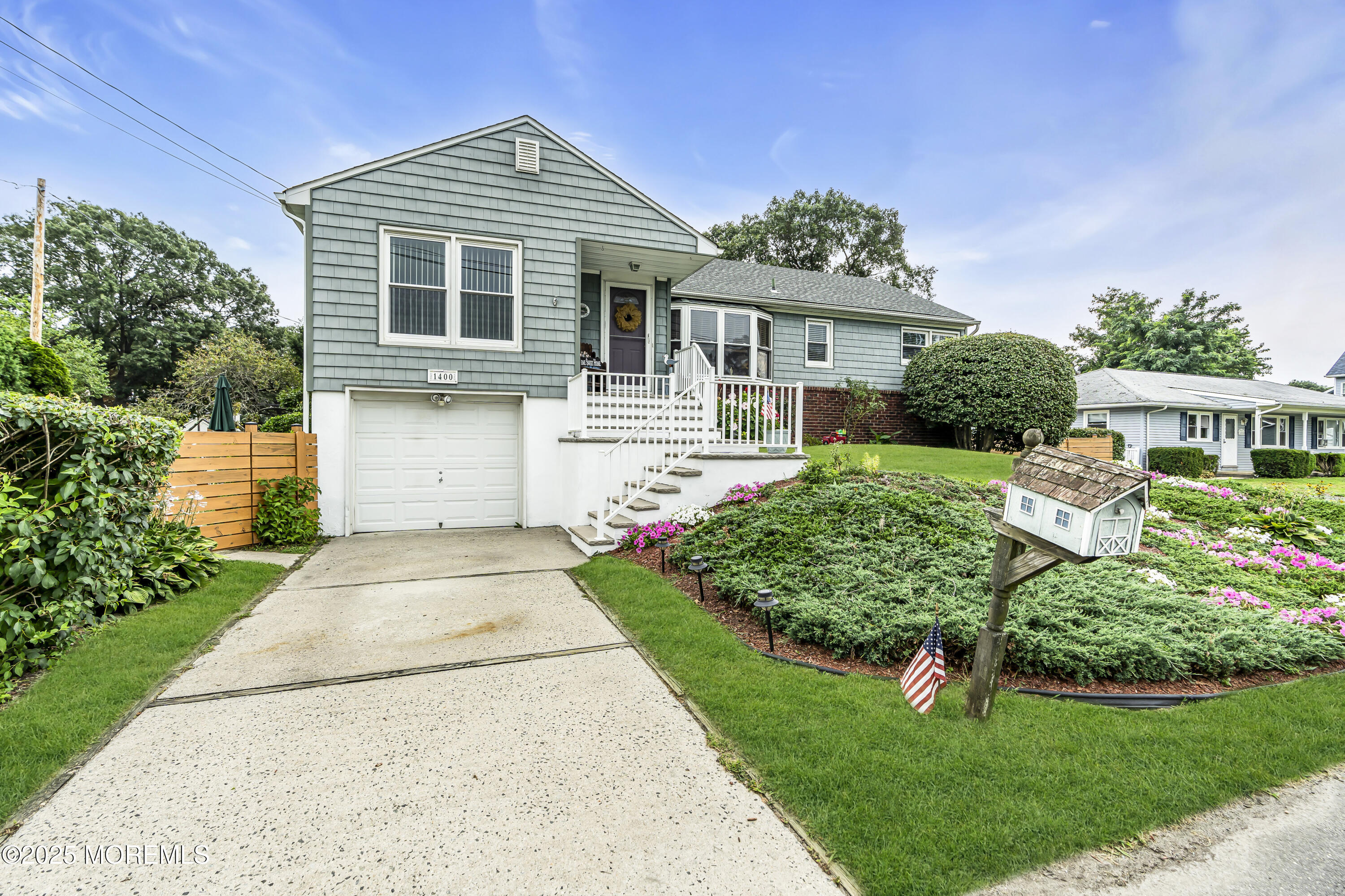 1400 Treeneedle Road Point Pleasant, NJ 08742 - Photo 7 of 45 a front view of a house with a yard