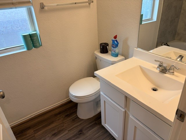 6917 Colorado Bluffs Road Austin, TX 78744 - Photo 12 of 19 a bathroom with a sink and a toilet