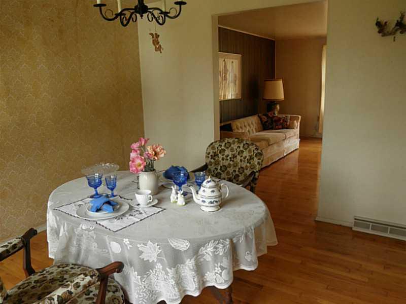 1432 Spring Run Road Extension Coraopolis, PA 15108 - Photo 11 of 25 Dining Room. Hardwood floors in good condition in the dining room.