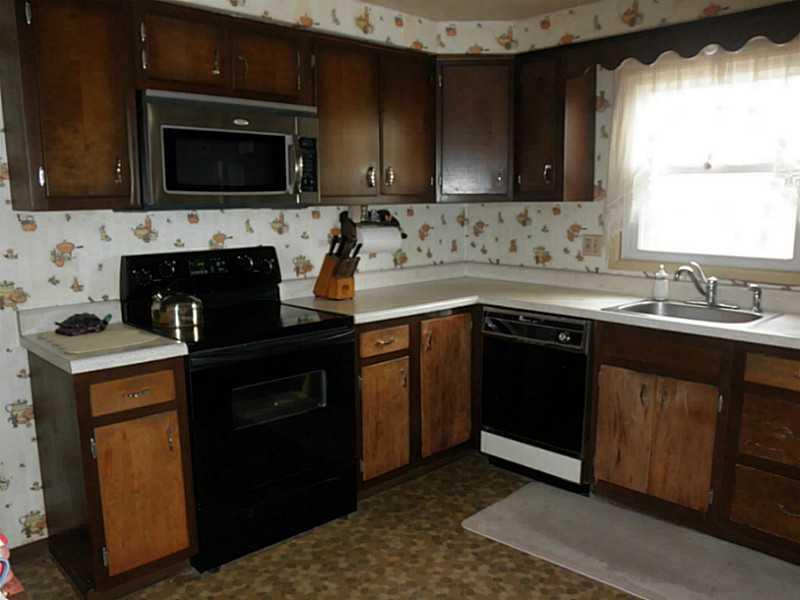 1432 Spring Run Road Extension Coraopolis, PA 15108 - Photo 14 of 25 Kitchen. Original kitchen with newer stainless built-in microwave.