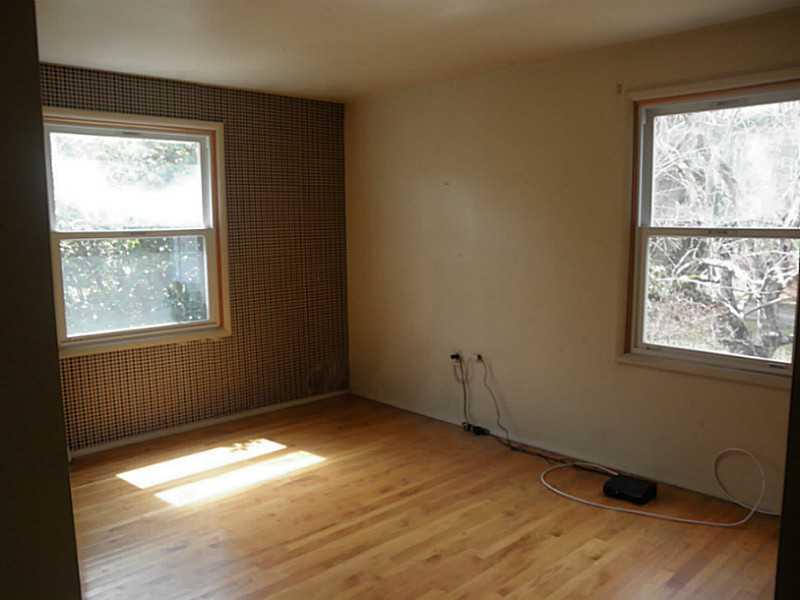 1432 Spring Run Road Extension Coraopolis, PA 15108 - Photo 18 of 25 Bedroom. Hardwood floors in excellent condition.