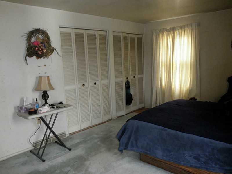 1432 Spring Run Road Extension Coraopolis, PA 15108 - Photo 21 of 25 Master Bedroom. Master has hardwood floors and two double door closets.