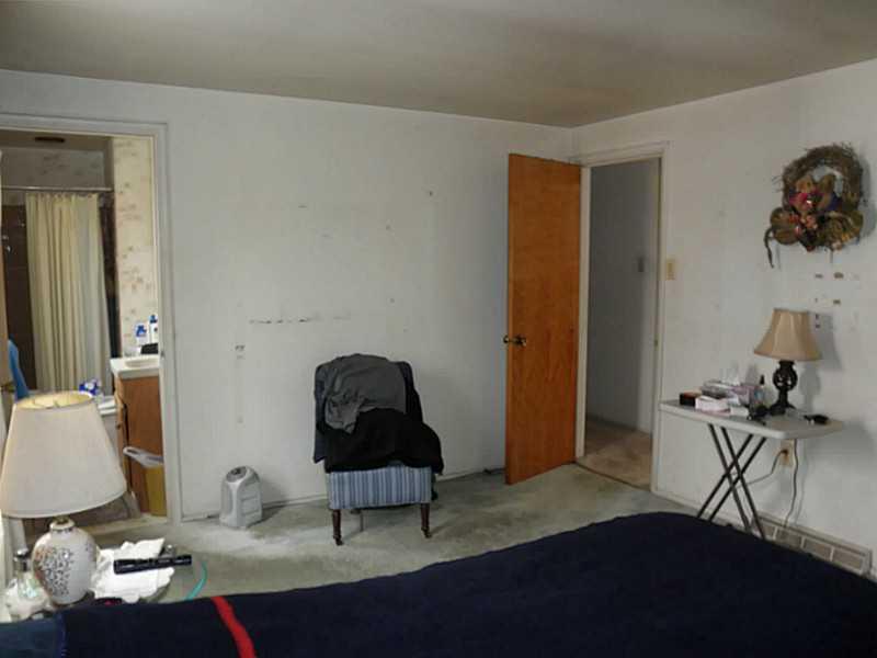 1432 Spring Run Road Extension Coraopolis, PA 15108 - Photo 22 of 25 Master Bedroom. Master bath has shower and single sink.