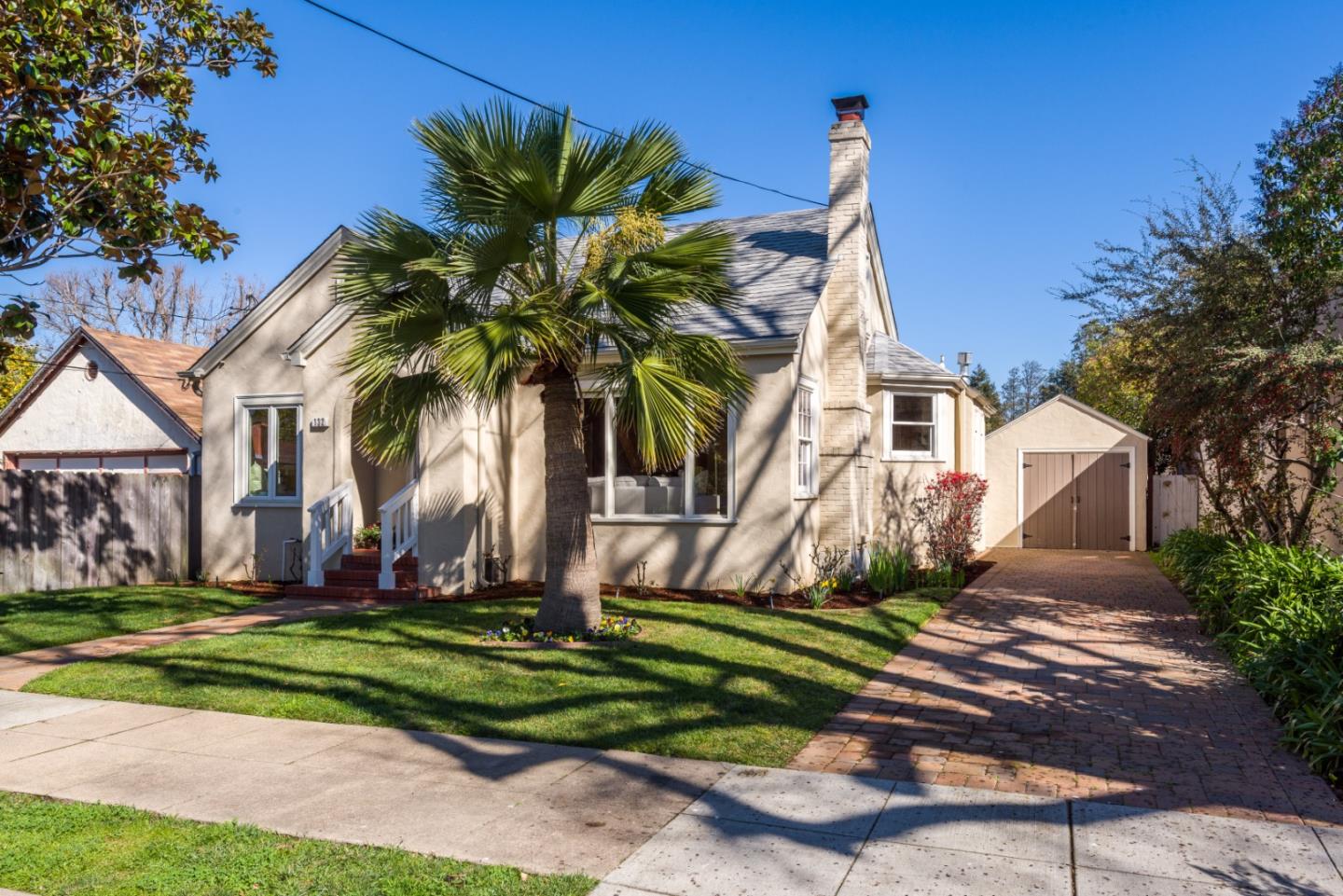 132 Bancroft Road Burlingame, CA 94010 - Photo 1 of 27 a front view of a house with garden