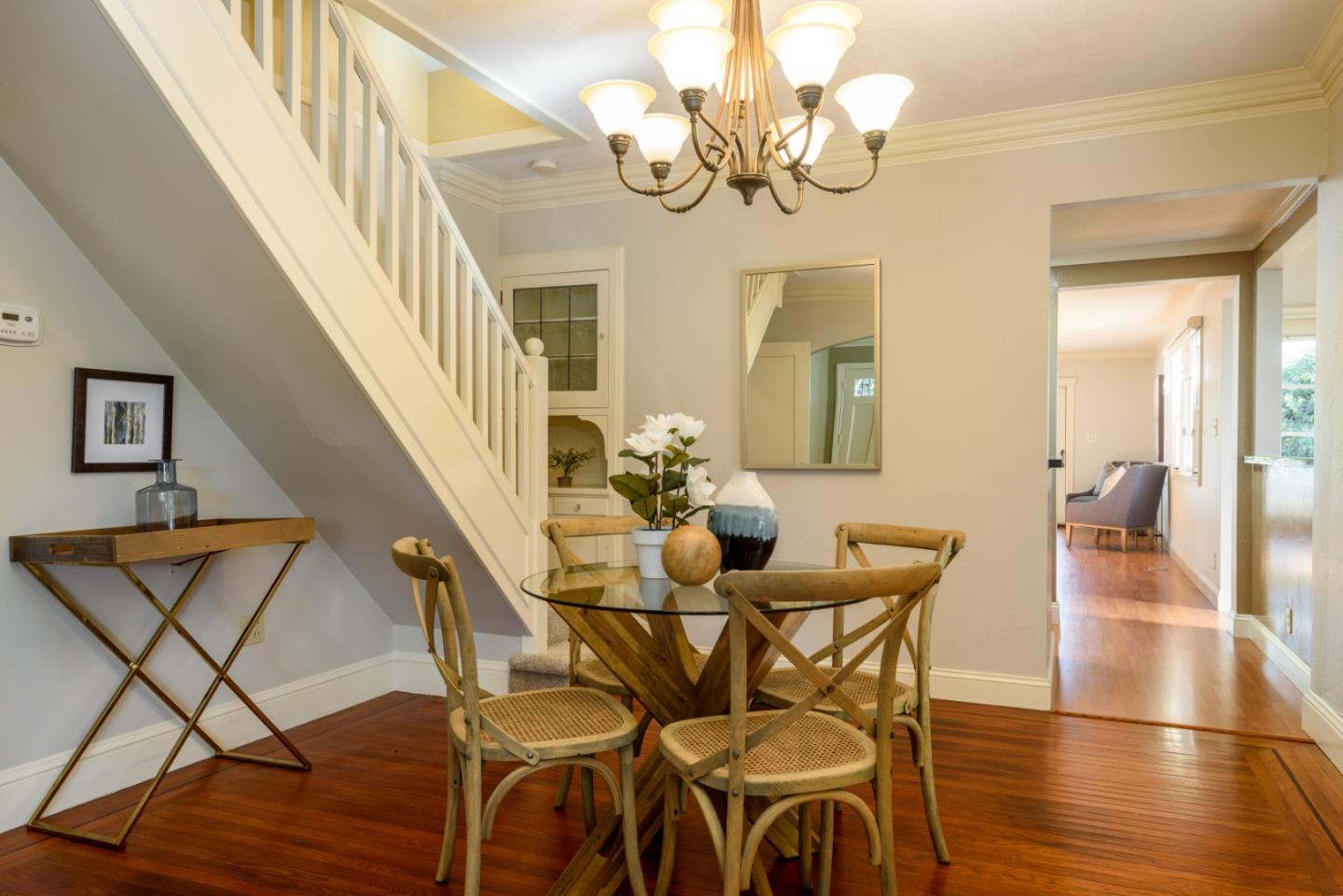 132 Bancroft Road Burlingame, CA 94010 - Photo 11 of 27 a view of a dining room with furniture and wooden floor