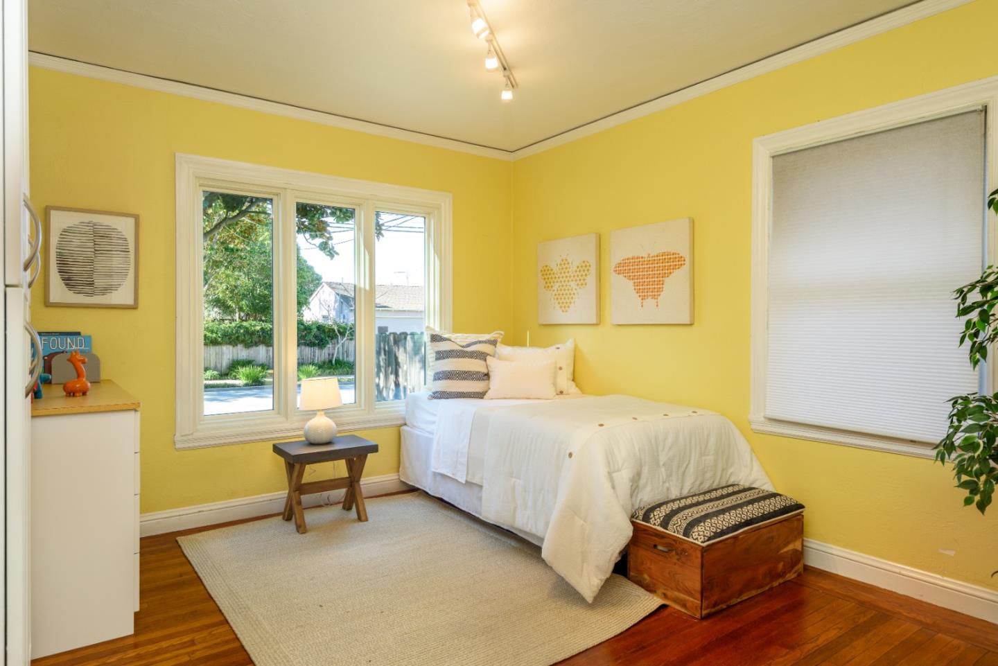132 Bancroft Road Burlingame, CA 94010 - Photo 18 of 27 a bedroom with a bed and a window