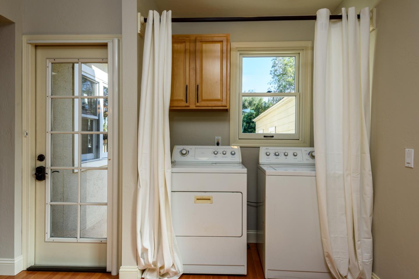 132 Bancroft Road Burlingame, CA 94010 - Photo 24 of 27 a utility room with dryer and washer