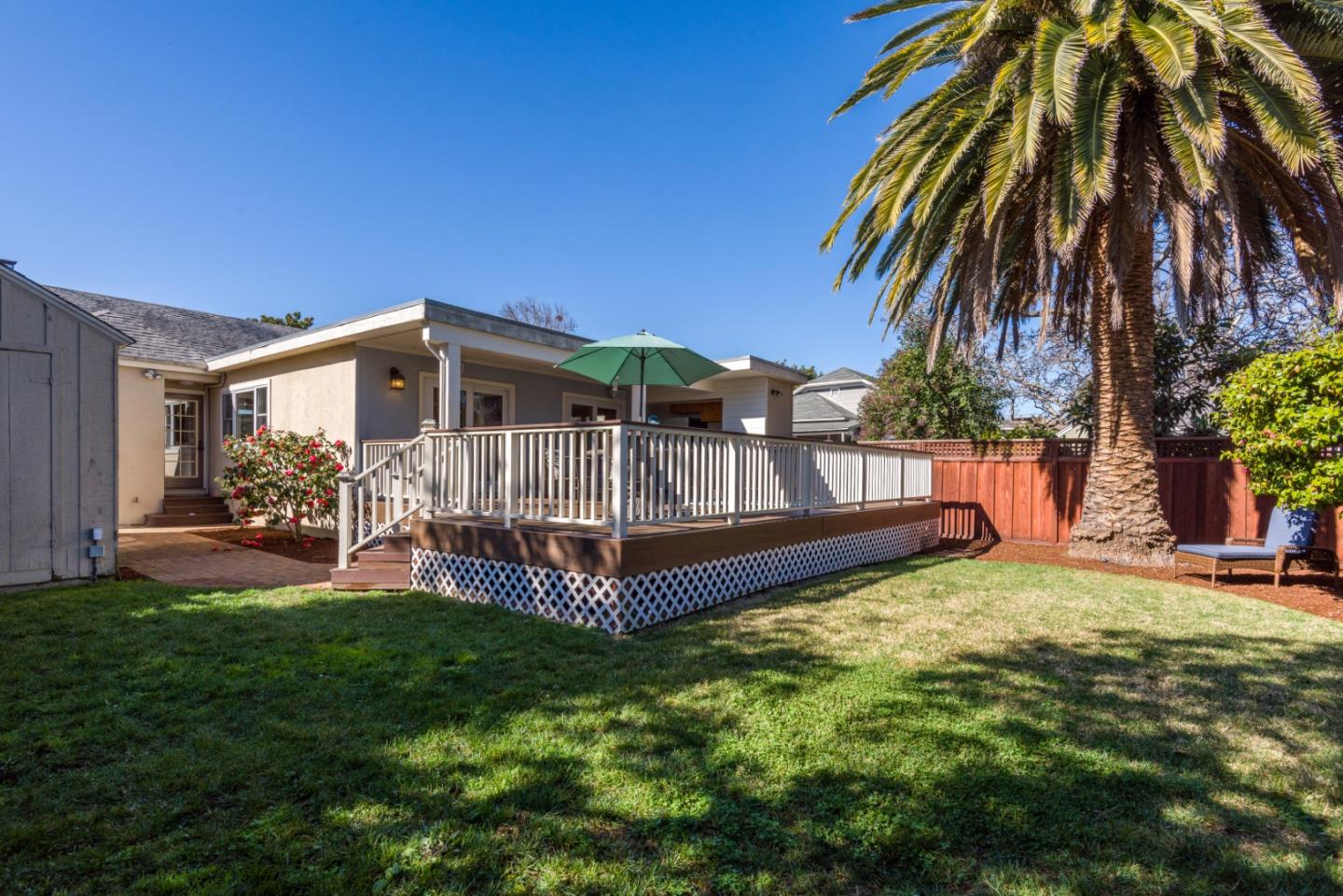132 Bancroft Road Burlingame, CA 94010 - Photo 27 of 27 a view of a house with a yard and deck