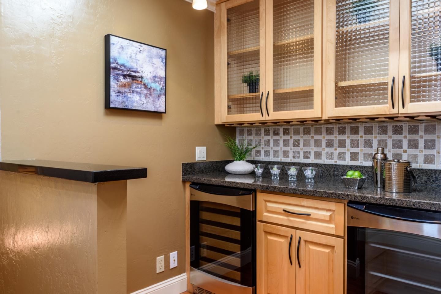 132 Bancroft Road Burlingame, CA 94010 - Photo 9 of 27 a kitchen with stainless steel appliances a sink stove and cabinets