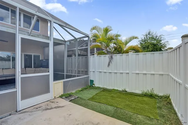 a view of outdoor space with garden and entryway