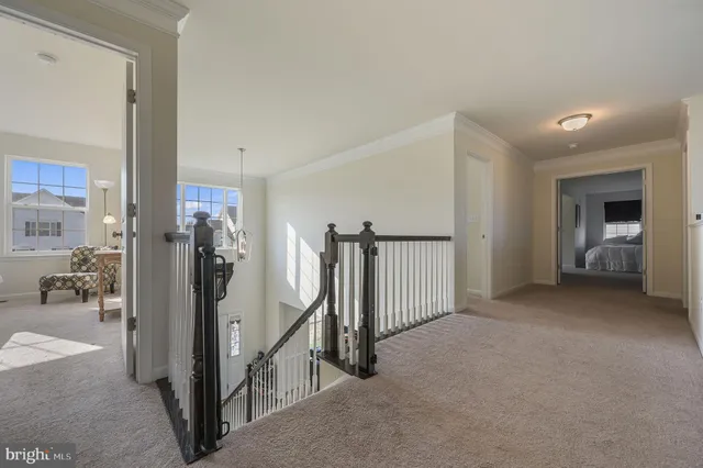 a view of a livingroom with a staircase