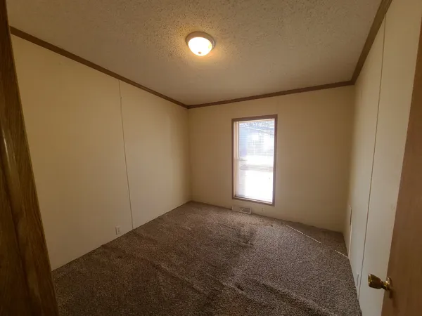 a view of empty room with window