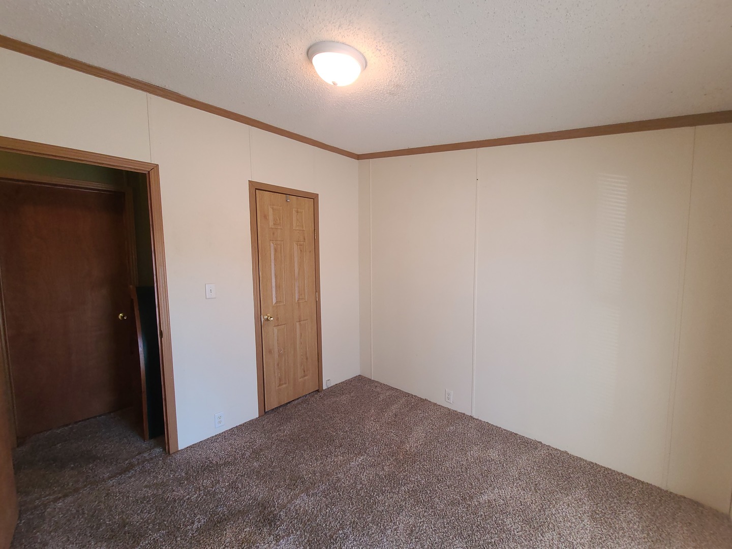 291 Highway 2, Unit 49 Dixon, IL 61021 - Photo 27 of 28 a view of an empty room