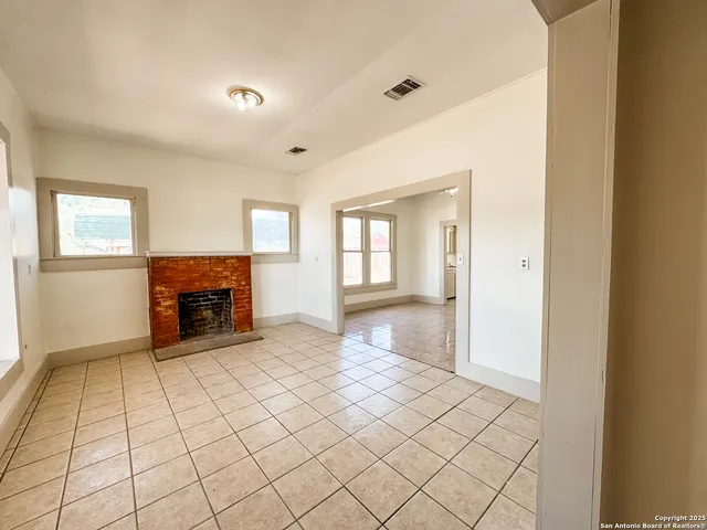 a view of a livingroom with a fireplace