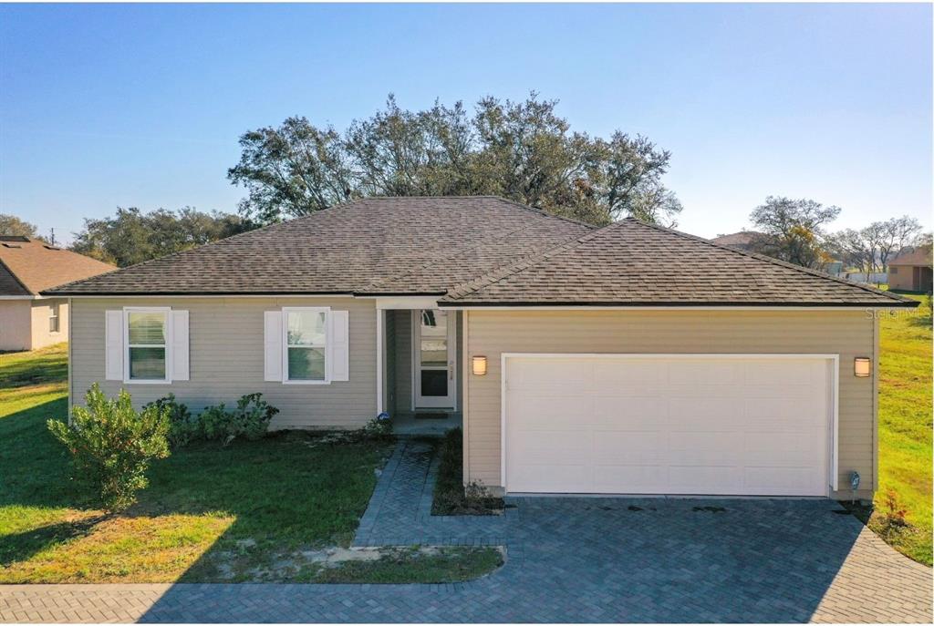 a front view of house with yard