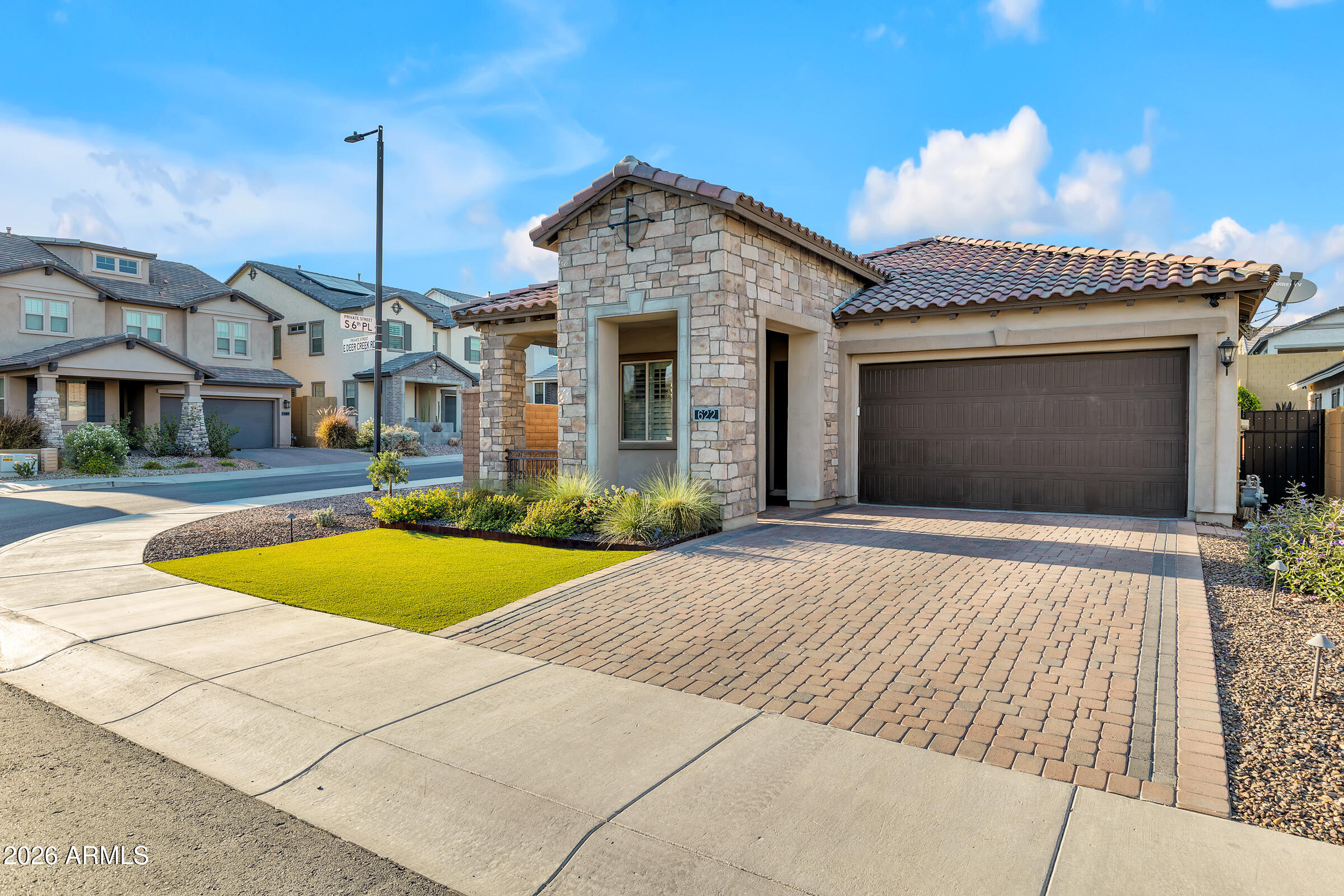 622 West Deer Creek Road Phoenix, AZ 85048 - Photo 2 of 39 a front view of a house with swimming pool