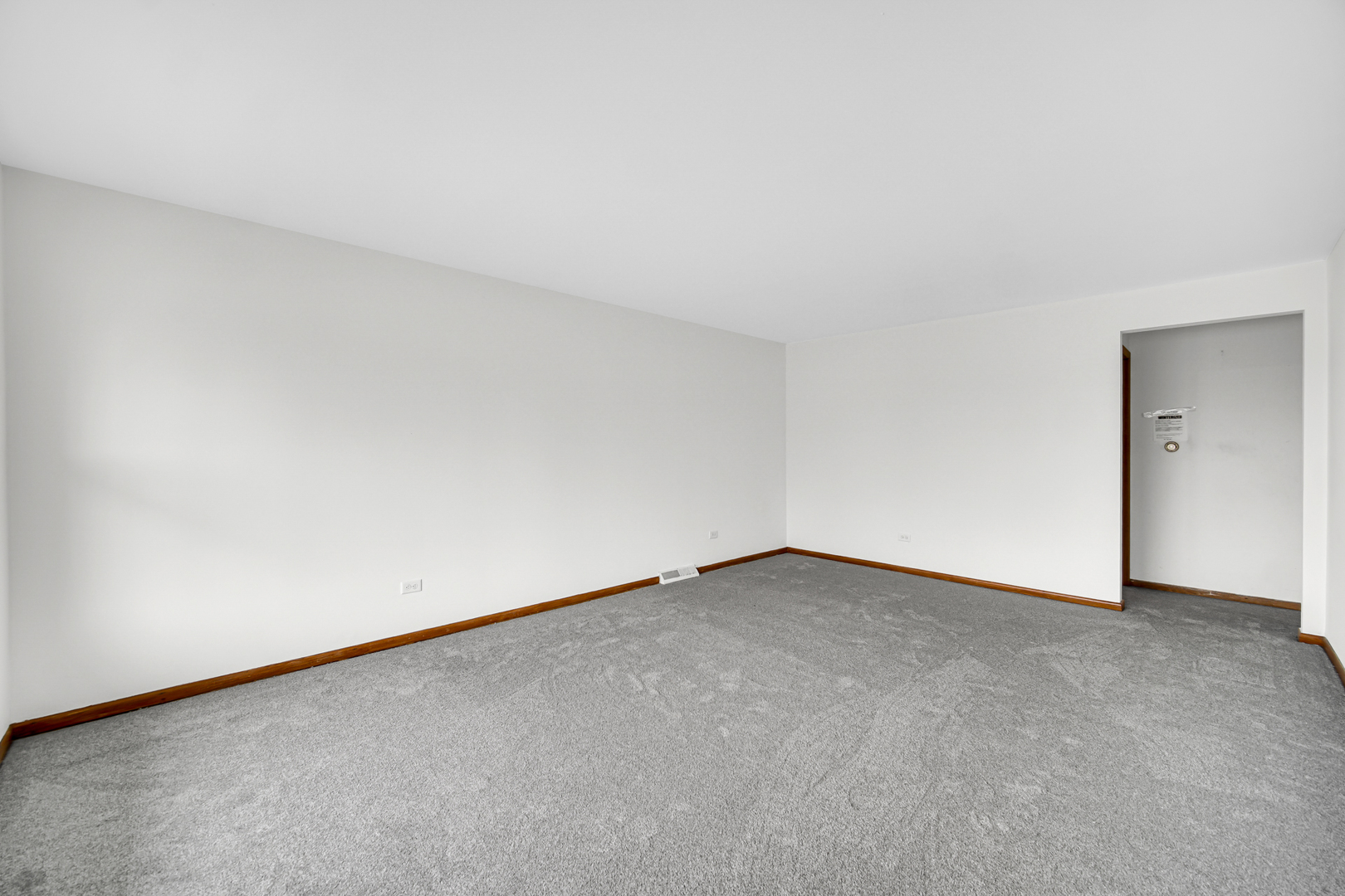 901 Oakton Street Park Ridge, IL 60068 - Photo 3 of 22 a view of an empty room and a window