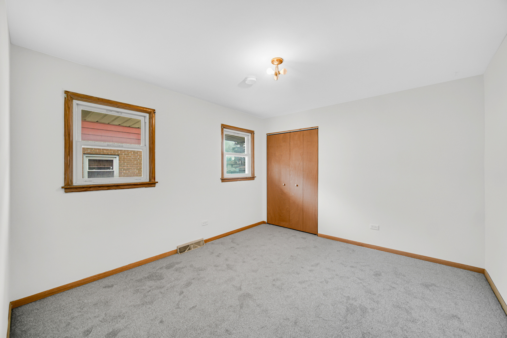 901 Oakton Street Park Ridge, IL 60068 - Photo 7 of 22 a view of an empty room with a window