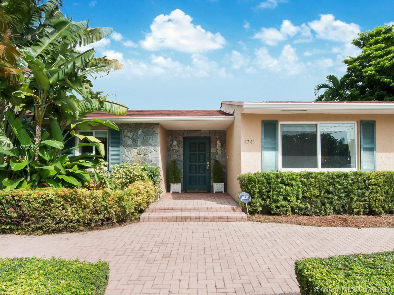 6701 Southwest 49th Terrace Miami, FL 33155 - Photo 3 of 24 front view of a house with a small yard