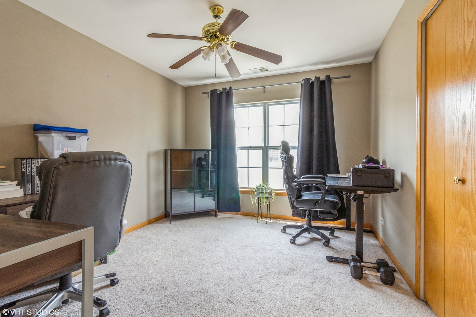 2029 Frantum Road, Unit 2029 Sycamore, IL 60178 - Photo 11 of 18 a view of a workspace with furniture and a window
