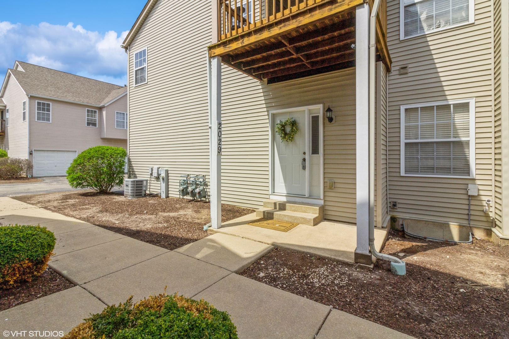 2029 Frantum Road, Unit 2029 Sycamore, IL 60178 - Photo 15 of 18 a view of a house with a patio