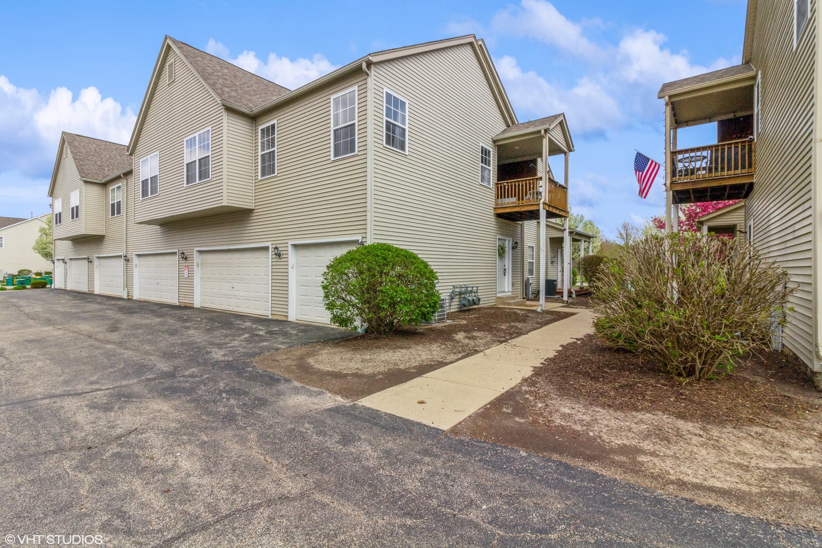 2029 Frantum Road, Unit 2029 Sycamore, IL 60178 - Photo 18 of 18 a view of a house with a yard and plants