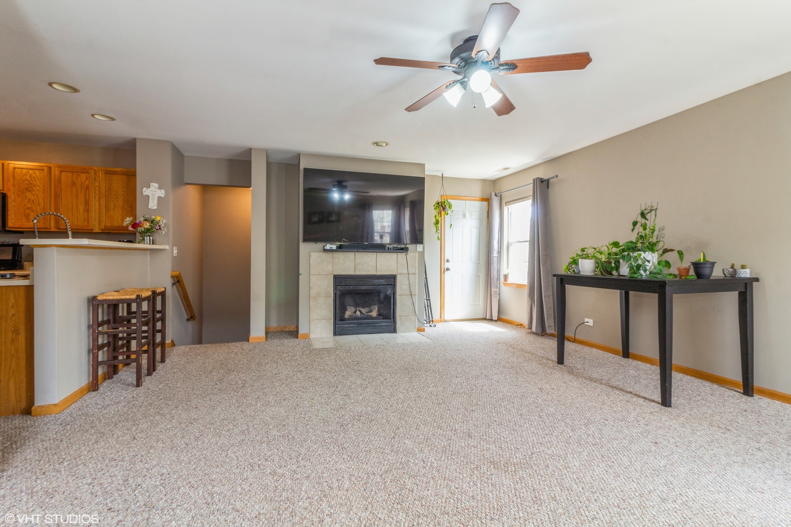 2029 Frantum Road, Unit 2029 Sycamore, IL 60178 - Photo 3 of 18 a view of an empty room with a fireplace