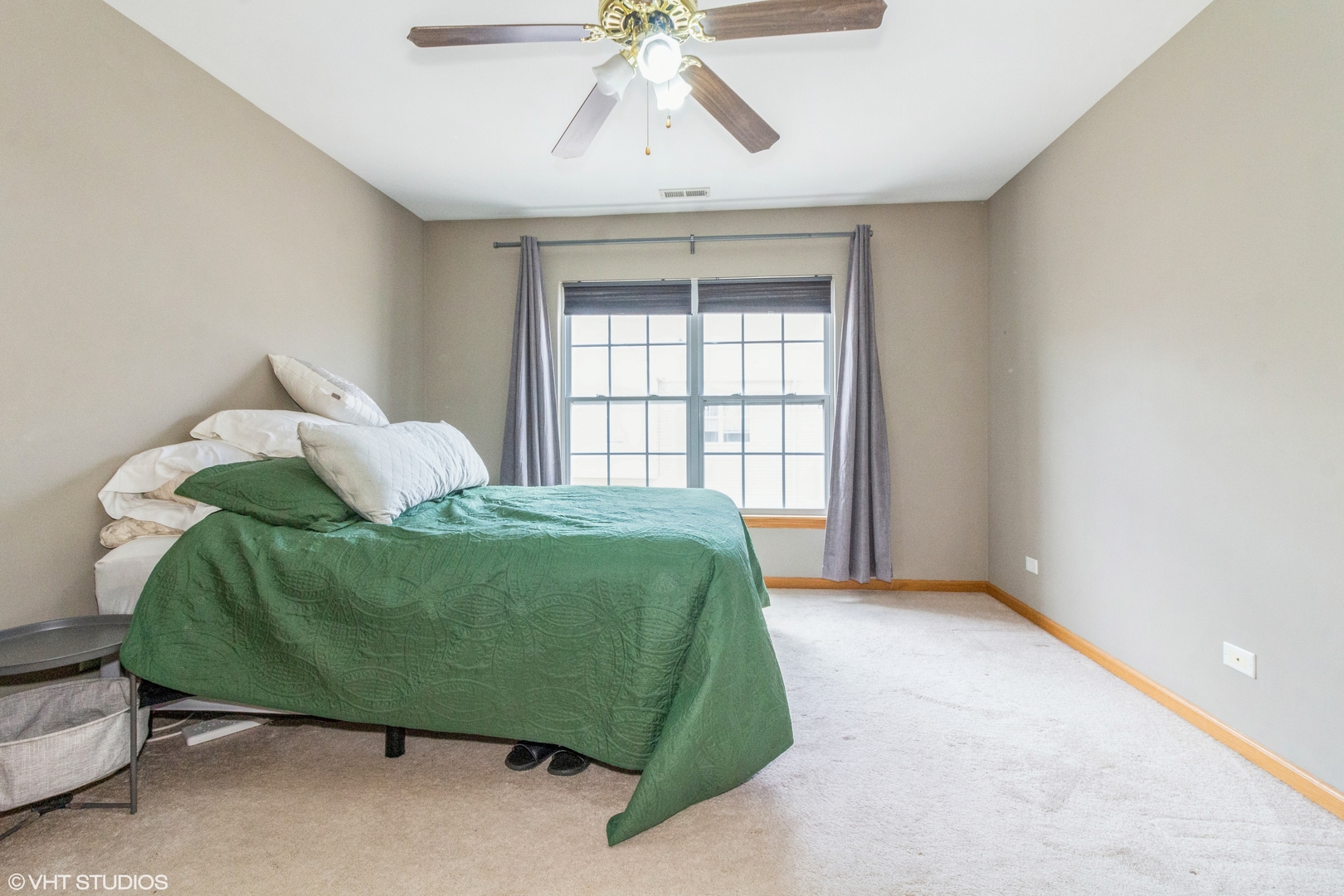 2029 Frantum Road, Unit 2029 Sycamore, IL 60178 - Photo 7 of 18 a living room with a bed and a window