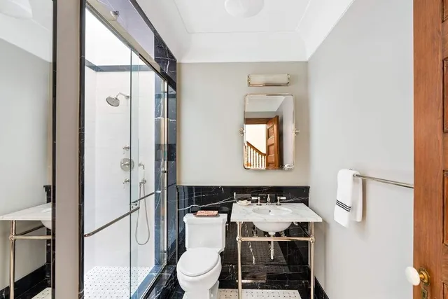 a view of a living room and workspace