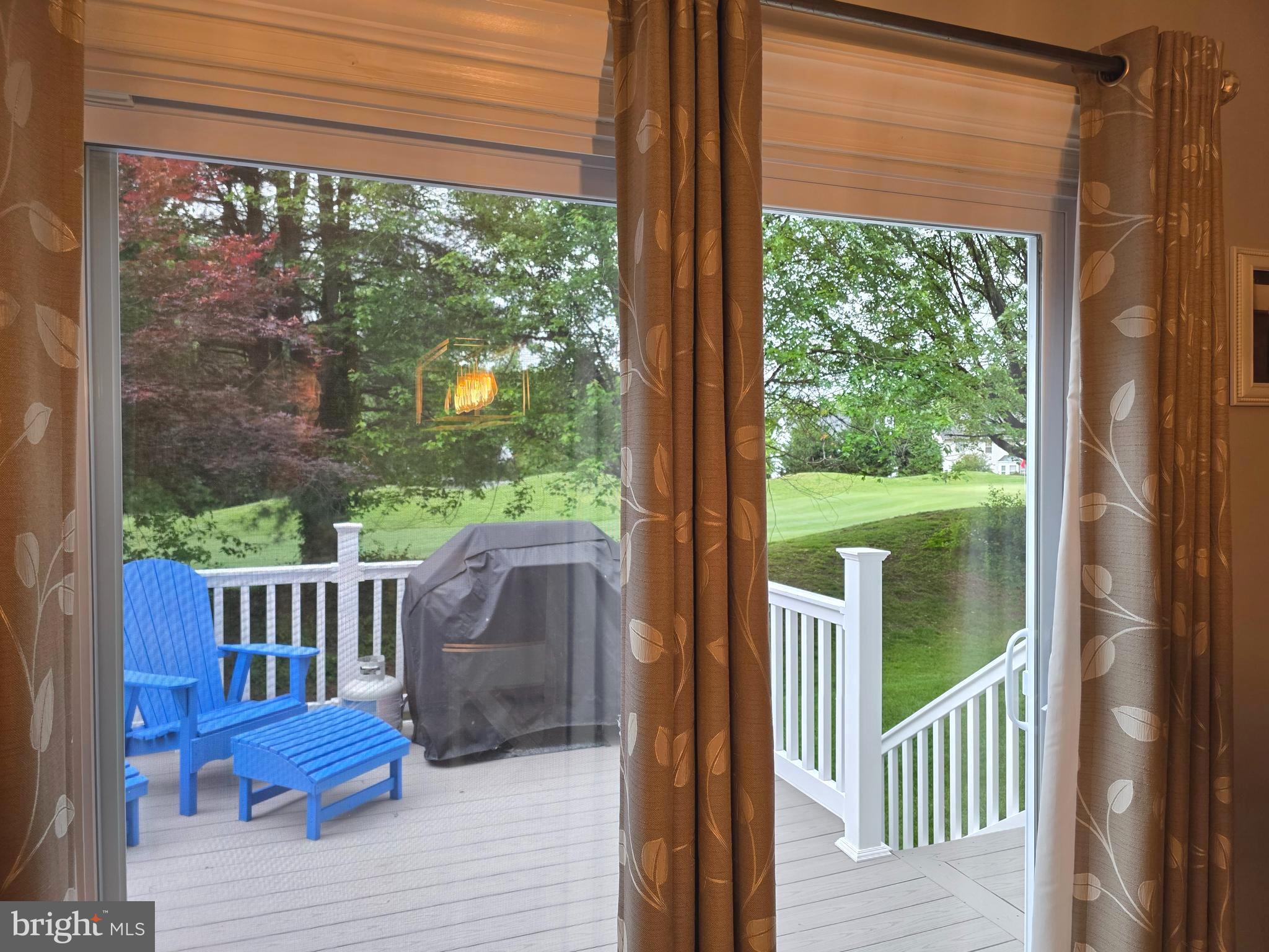 2441 Kemper Road Crofton, MD 21114 - Photo 20 of 63 a view of a chair and table in the balcony