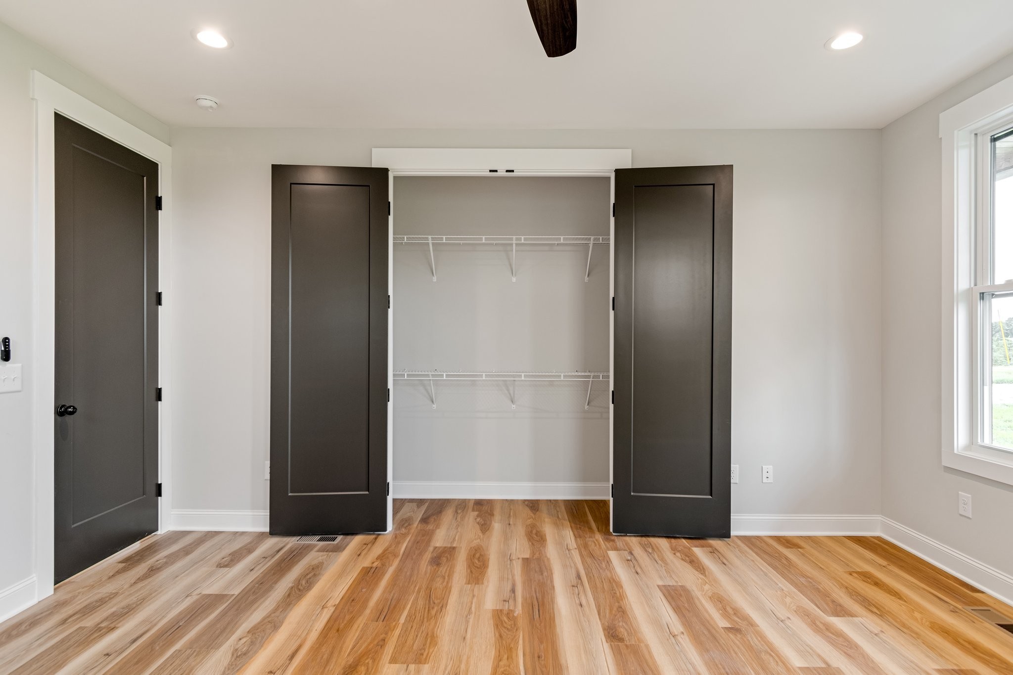 2675 Monte Murrey Road Lewisburg, TN 37091 - Photo 27 of 61 a view of an empty room with wooden floor and a window