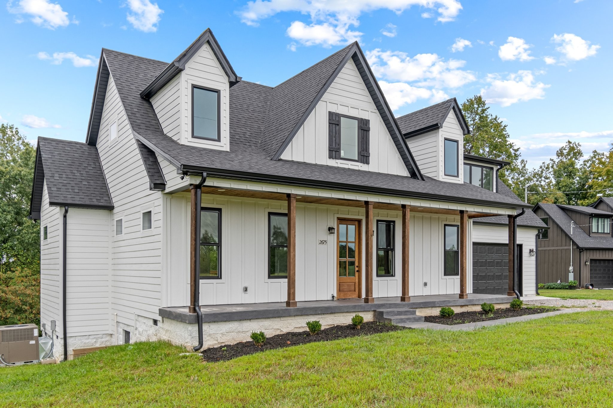 2675 Monte Murrey Road Lewisburg, TN 37091 - Photo 4 of 61 a front view of a house with a yard