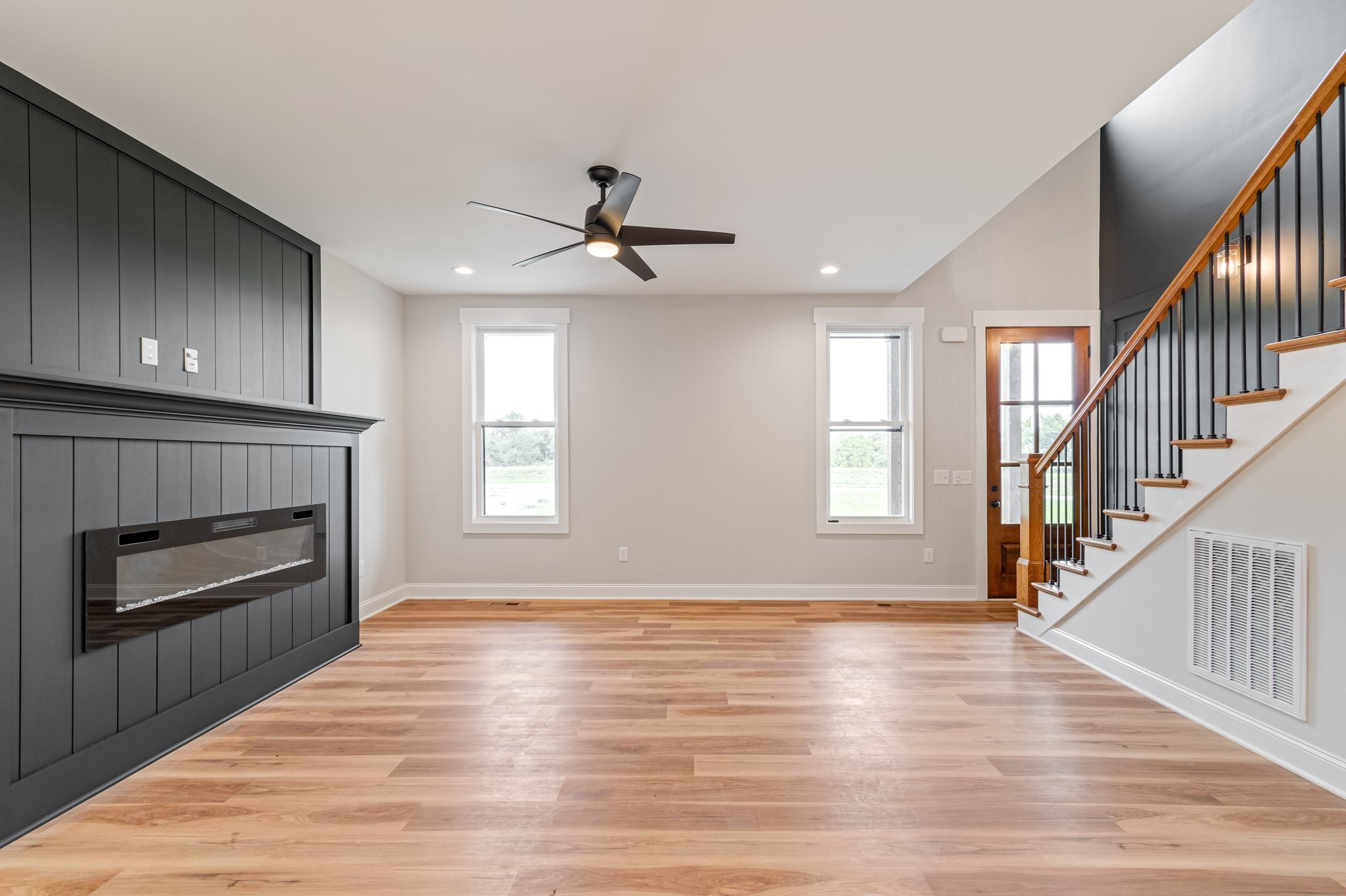 2675 Monte Murrey Road Lewisburg, TN 37091 - Photo 10 of 61 a view of an empty room with wooden floor fireplace and a window