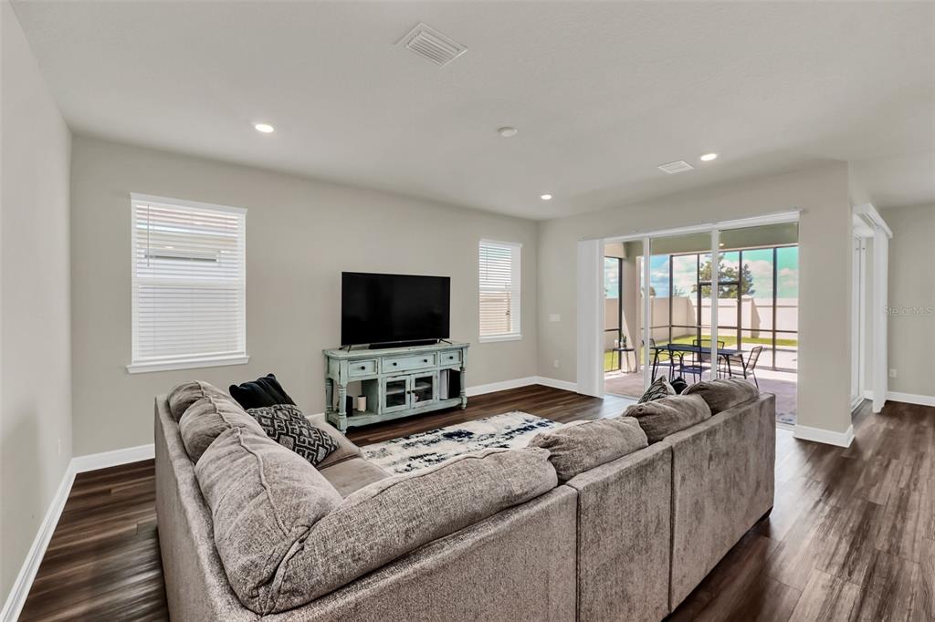 2001 Spring Shower Circle Kissimmee, FL 34744 - Photo 3 of 25 a living room with furniture and a flat screen tv